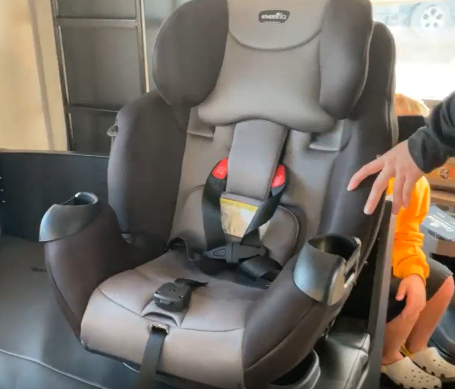 Connecting a child safety seat to the rentals Campervan in San Diego